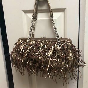 Michael kors bag. Soft metallic leather fringe and beads. With bag.authentic